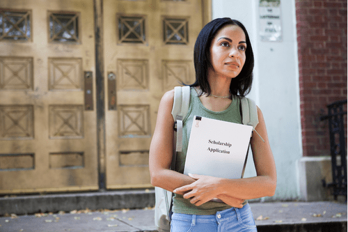 Girl holding a scholarship application 